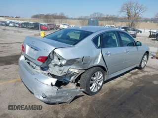 2010 Infiniti M with VIN JN1CY0AR1AM961741, listed as a IAAI auction lot 41905630 with 100,170 mi miles. Bid and sale history available at carsss.com. Image 4.