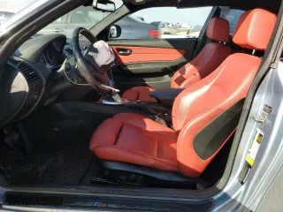 2011 BMW 1 Series 135i with VIN WBAUC9C59BVM11260, listed as a Copart auction lot 86721684 with 56,914 mi miles and Salvage Title. Bid and sale history available at carsss.com. Image 7.
