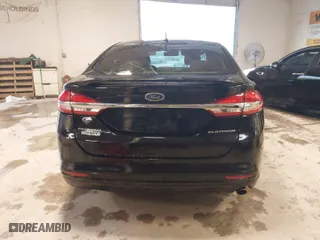 2017 Ford Fusion Energi Titanium with VIN 3FA6P0SU8HR215570, listed as a IAAI auction lot 41427407 with 97,281 mi miles. Bid and sale history available at carsss.com. Image 16.