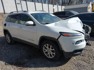 2015 Jeep Cherokee Latitude with VIN 1C4PJMCS7FW503594, listed as a IAAI auction lot 41792820 with 77,325 mi miles. Bid and sale history available at carsss.com. Image 1.