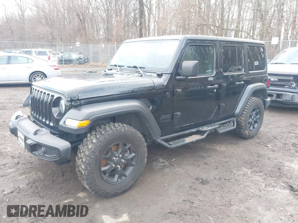 2022 Jeep Wrangler Unlimited Sport S with VIN 1C4HJXDG1NW141244, listed as a IAAI auction lot 41532388 with 27,829 mi miles. Bid and sale history available at carsss.com. Image 22.