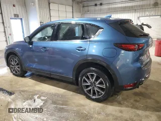 2018 Mazda CX-5 Grand Touring with VIN JM3KFBDM9J0411504, listed as a Copart auction lot 42050825 with 125,695 mi miles and Salvage Title. Bid and sale history available at carsss.com. Image 2.