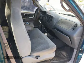 2000 Ford F-150 XL with VIN 1FTZF0722YKB38958, listed as a IAAI auction lot 42050827 with 235,315 mi miles. Bid and sale history available at carsss.com. Image 5.