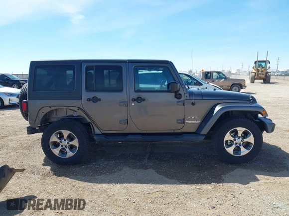 2017 Jeep Wrangler Unlimited Sahara with VIN 1C4BJWEG7HL641347, listed as a IAAI auction lot 41833356 with 84,735 mi miles. Bid and sale history available at carsss.com. Image 14.