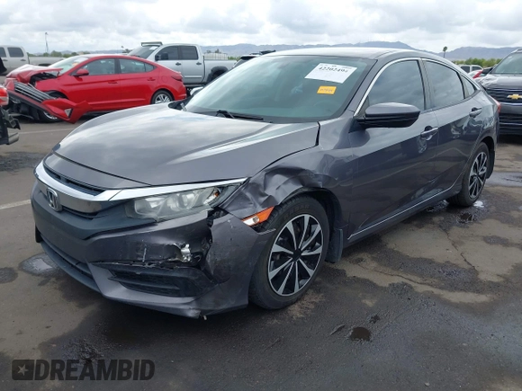 2017 Honda Civic LX with VIN 19XFC2F50HE055888, listed as a IAAI auction lot 42202494 with 147,354 mi miles and . Bid and sale history available at DreamBid. Image 6.