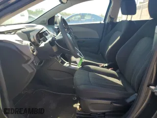 2014 Chevrolet Sonic LT with VIN 1G1JC6SH9E4170822, listed as a Copart auction lot 58460254 with 158,792 mi miles and Salvage Title. Bid and sale history available at carsss.com. Image 7.