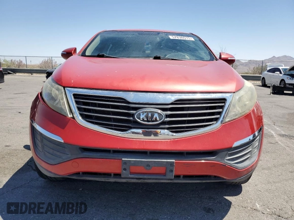 2012 Kia Sportage LX with VIN KNDPB3A25C7345952, listed as a Copart auction lot 57830015 with 101,757 mi miles and Salvage title. Bid and sale history available at DreamBid. Image 5.