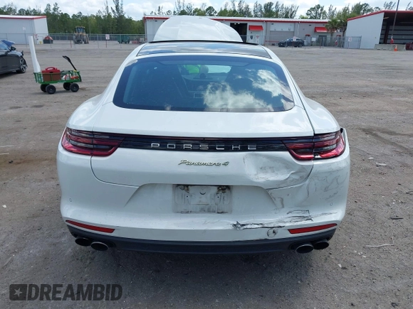 2018 Porsche Panamera 4 E-Hybrid with VIN WP0AE2A74JL130540, listed as a IAAI auction lot 42078444 with 65,981 mi miles and . Bid and sale history available at DreamBid. Image 6.