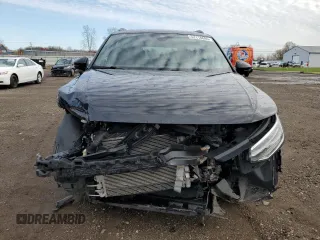 2022 Volkswagen Tiguan SE R-Line Black z VIN 3VV8B7AX9NM088599, wystawiony jako Copart lot #52118695 z przebiegiem 27 836 mil mil oraz Szkody całkowita. Historia ofert i sprzedaży dostępna na DreamBid. Obrazek 5.