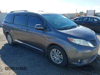 2014 Toyota Sienna XLE with VIN 5TDYK3DC9ES482054, listed as a IAAI auction lot 41494502 with 152,628 mi miles. Bid and sale history available at carsss.com. Image 1.