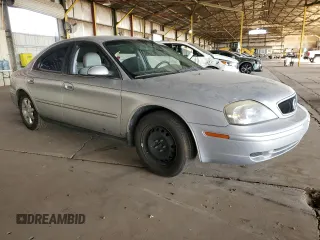 2001 Mercury Sable z VIN 1MEFM53U11G615352, wystawiony jako Copart lot #47451095 z przebiegiem 94 093 mil mil oraz Szkoda całkowita • Salvage title. Historia ofert i sprzedaży dostępna na DreamBid. Obrazek 4.