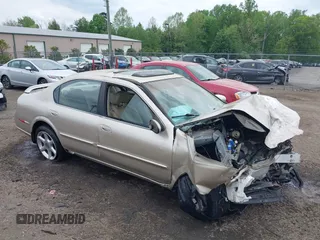 2000 Nissan Maxima GXE z VIN JN1CA31D2YT531324, wystawiony jako IAAI lot #42126970 z przebiegiem 141 864 mil mil oraz . Historia ofert i sprzedaży dostępna na DreamBid. Obrazek 1.