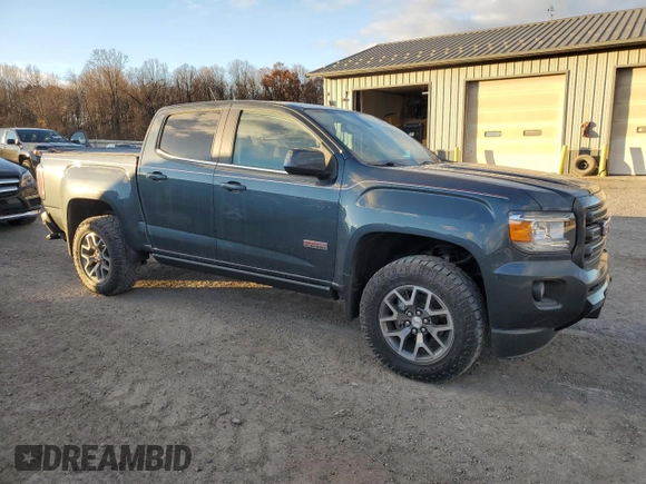 2020 GMC Canyon 4WD All Terrain w/Cloth with VIN 1GTG6FEN0L1173679, listed as a Copart auction lot 79684354 with 58,901 mi miles and Salvage Title. Bid and sale history available at carsss.com. Image 4.