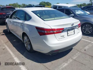 2014 Toyota Avalon Limited with VIN 4T1BK1EB0EU122498, listed as a IAAI auction lot 40248080 with 126,818 mi miles and . Bid and sale history available at DreamBid. Image 3.