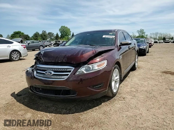 2012 Ford Taurus Limited z VIN 1FAHP2FW4CG112923, wystawiony jako Copart lot #56169085 z przebiegiem 142 687 mil mil oraz Szkoda całkowita • Salvage title. Historia ofert i sprzedaży dostępna na DreamBid. Obrazek 13.