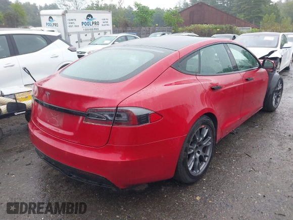 2021 Tesla Model S Long Range with VIN 5YJSA1E53MF428488, listed as a IAAI auction lot 42511017 with 68,482 mi miles and . Bid and sale history available at DreamBid. Image 4.
