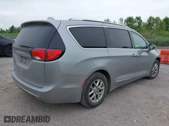 2020 Chrysler Pacifica Touring L with VIN 2C4RC1BG2LR127986, listed as a IAAI auction lot 42419518 with 107,618 mi miles and . Bid and sale history available at DreamBid. Image 4.