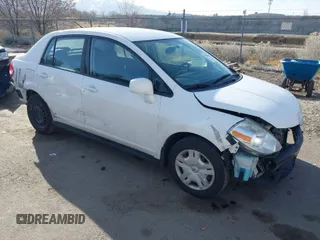 2010 Nissan Versa 1.8 S with VIN 3N1BC1AP8AL465537, listed as a IAAI auction lot 41762115 with 163,533 mi miles. Bid and sale history available at carsss.com. Image 1.