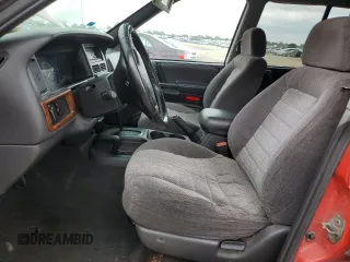 1997 Jeep Grand Cherokee Laredo with VIN 1J4GZ58S3VC770085, listed as a Copart auction lot 57584684 with 0 mi miles and Clean Title. Bid and sale history available at carsss.com. Image 7.