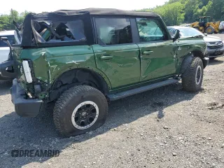 2023 Ford Bronco z VIN 1FMEE5DP7PLB60568, wystawiony jako Copart lot #62118915 z przebiegiem 25 681 mil mil oraz Nie do naprawy • Non repairable. Historia ofert i sprzedaży dostępna na DreamBid. Obrazek 3.