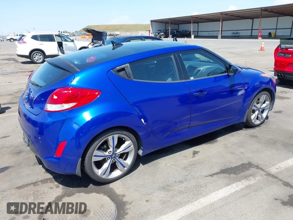 2013 Hyundai Veloster w/Black Int with VIN KMHTC6AD6DU143974, listed as a IAAI auction lot 42164745 with 136,195 mi miles and . Bid and sale history available at DreamBid. Image 4.