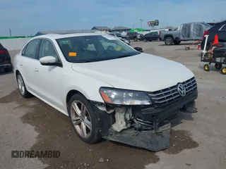 2014 Volkswagen Passat SE z VIN 1VWBN7A32EC003724, wystawiony jako IAAI lot #41890800 z przebiegiem 117 070 mil mil oraz . Historia ofert i sprzedaży dostępna na DreamBid. Obrazek 1.