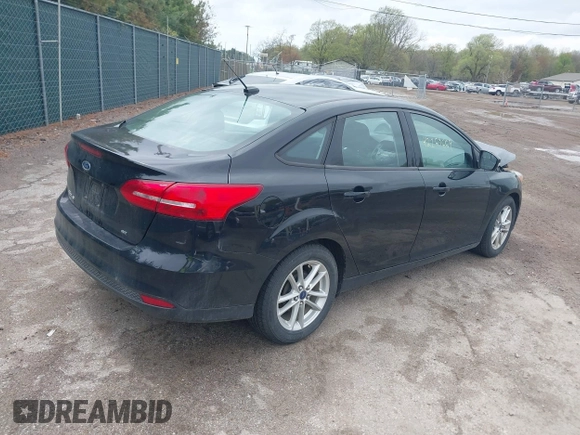 2017 Ford Focus SE with VIN 1FADP3F25HL239809, listed as a IAAI auction lot 42163669 with 140,220 mi miles and . Bid and sale history available at DreamBid. Image 4.