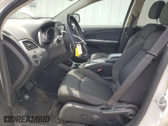 2017 Dodge Journey SXT with VIN 3C4PDDBG0HT542623, listed as a Copart auction lot 61628385 with 130,285 mi miles and Salvage title. Bid and sale history available at DreamBid. Image 7.