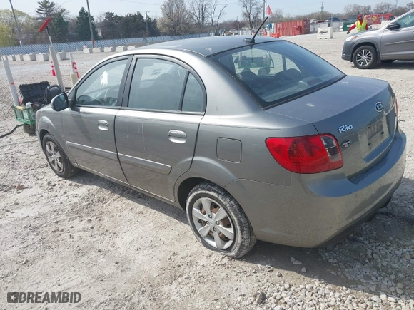 2011 Kia Rio LX with VIN KNADH4A39B6923388, listed as a IAAI auction lot 42060176 with 98,690 mi miles. Bid and sale history available at carsss.com. Image 3.