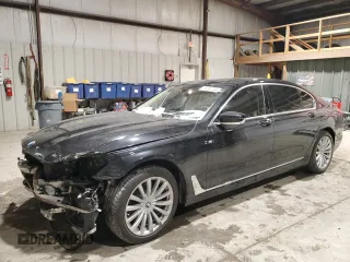 2017 BMW 7 Series 740i with VIN WBA7E2C3XHG741046, listed as a Copart auction lot 45382705 with 99,065 mi miles and Salvage Title. Bid and sale history available at carsss.com. Image 1.