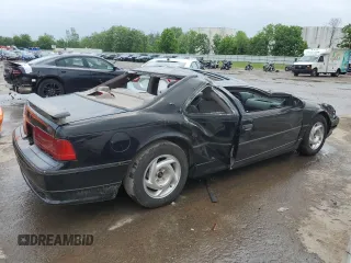 1989 Ford Thunderbird z VIN 1FAPP64R0KH161691, wystawiony jako Copart lot #60097275 z przebiegiem 70 041 mil mil oraz Szkoda całkowita • Salvage title. Historia ofert i sprzedaży dostępna na DreamBid. Obrazek 3.
