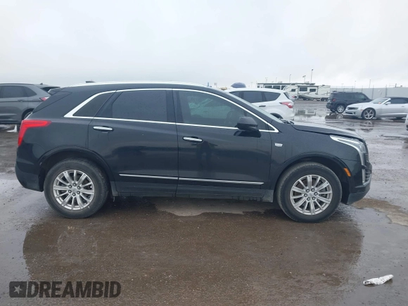2017 Cadillac XT5 FWD with VIN 1GYKNARS0HZ317508, listed as a IAAI auction lot 40818768 with 132,598 mi miles. Bid and sale history available at carsss.com. Image 13.