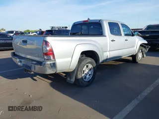 2012 Toyota Tacoma with VIN 3TMMU4FN5CM047333, listed as a IAAI auction lot 42082248 with 192,467 mi miles and . Bid and sale history available at DreamBid. Image 4.