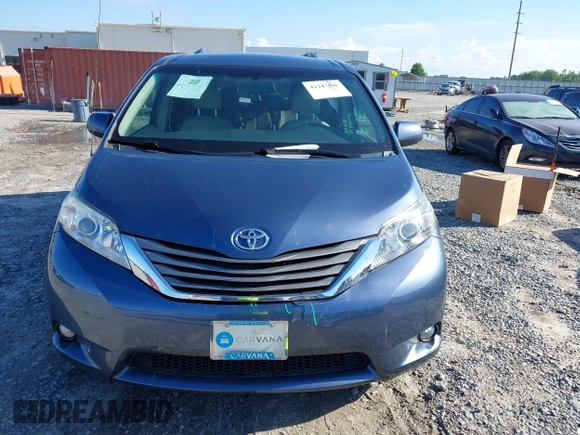2014 Toyota Sienna XLE with VIN 5TDYK3DC9ES526117, listed as a IAAI auction lot 42247546 with 119,096 mi miles and . Bid and sale history available at DreamBid. Image 12.