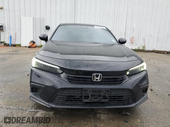 2023 Honda Civic Sport with VIN 2HGFE2F52PH548082, listed as a Copart auction lot 57226055 with 33,155 mi miles and Salvage title. Bid and sale history available at DreamBid. Image 5.