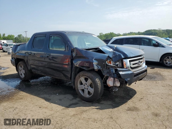 2010 Honda Ridgeline RTL with VIN 5FPYK1F5XAB004153, listed as a Copart auction lot 59710535 with Not provided miles and Salvage title. Bid and sale history available at DreamBid. Image 4.