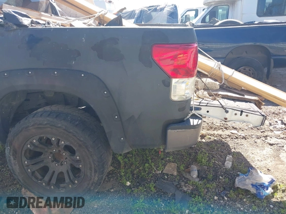 2013 Toyota Tundra 4WD Truck with VIN 5TFDW5F14DX279527, listed as a IAAI auction lot 41594899 with 212,973 mi miles. Bid and sale history available at carsss.com. Image 6.