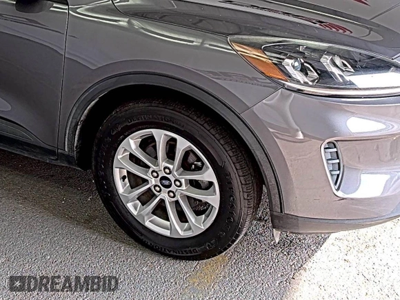 2021 Ford Escape SE with VIN 1FMCU9G6XMUA73547, listed as a IAAI auction lot 42757818 with 86,882 mi miles and . Bid and sale history available at DreamBid. Image 1.