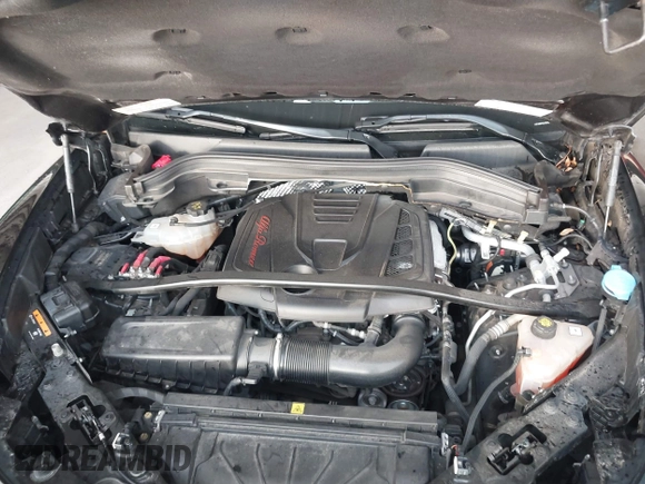 2018 Alfa Romeo Stelvio Sport z VIN ZASFAKPN9J7B70085, wystawiony jako IAAI lot #40823547 z przebiegiem Nie podano mil oraz . Historia ofert i sprzedaży dostępna na DreamBid. Obrazek 10.