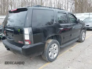 2011 GMC Yukon SLT with VIN 1GKS2CE01BR347675, listed as a IAAI auction lot 41931635 with 247,817 mi miles. Bid and sale history available at carsss.com. Image 4.