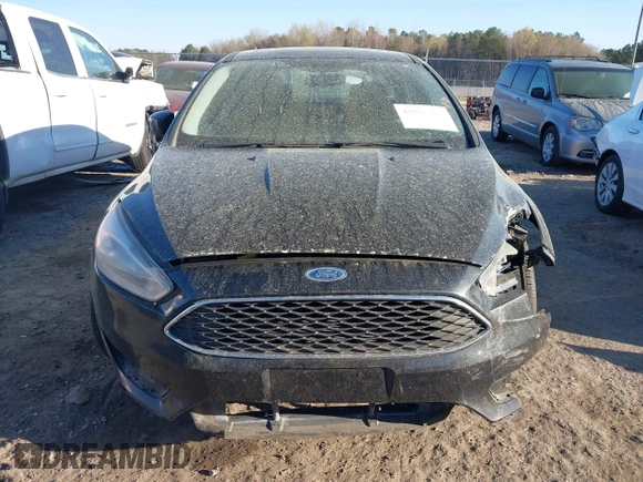 2015 Ford Focus SE with VIN 1FADP3F29FL210973, listed as a IAAI auction lot 41874367 with 128,705 mi miles. Bid and sale history available at carsss.com. Image 12.