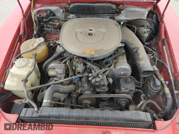 1985 Mercedes-Benz 380 z VIN WDBBA45C9FA017476, wystawiony jako Copart lot #58777585 z przebiegiem 135 805 mil mil oraz Szkoda całkowita • Salvage title. Historia ofert i sprzedaży dostępna na DreamBid. Obrazek 11.