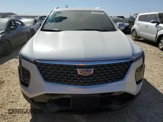 2024 Cadillac XT4 FWD Premium Luxury z VIN 1GYFZCR44RF239840, wystawiony jako Copart lot #48870445 z przebiegiem 5 276 mil mil oraz Szkoda całkowita • Salvage title. Historia ofert i sprzedaży dostępna na DreamBid. Obrazek 5.