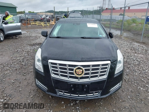 2014 Cadillac XTS Luxury with VIN 2G61M5S32E9231544, listed as a IAAI auction lot 42340088 with 74,518 mi miles and . Bid and sale history available at DreamBid. Image 12.