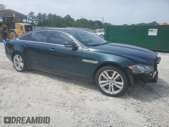 2017 Jaguar XJ Portfolio with VIN SAJWJ2GD7H8W11167, listed as a Copart auction lot 57103195 with 17,355 mi miles and Salvage title. Bid and sale history available at DreamBid. Image 4.