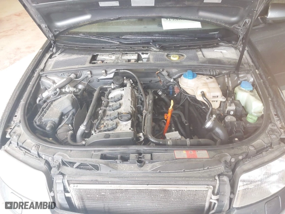 2004 Audi A4 1.8T with VIN WAULC68E04A055889, listed as a IAAI auction lot 41986309 with 124,598 mi miles. Bid and sale history available at carsss.com. Image 10.