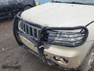 2011 Jeep Grand Cherokee Laredo with VIN 1J4RR4GG9BC563065, listed as a IAAI auction lot 41798136 with 192,149 mi miles. Bid and sale history available at carsss.com. Image 6.