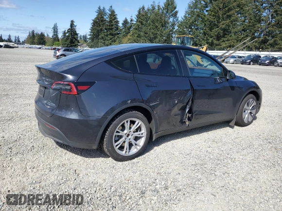 2024 Tesla Model Y Long Range with VIN 7SAYGAEE8RF987571, listed as a Copart auction lot 55110485 with 19,732 mi miles and Salvage title. Bid and sale history available at DreamBid. Image 3.