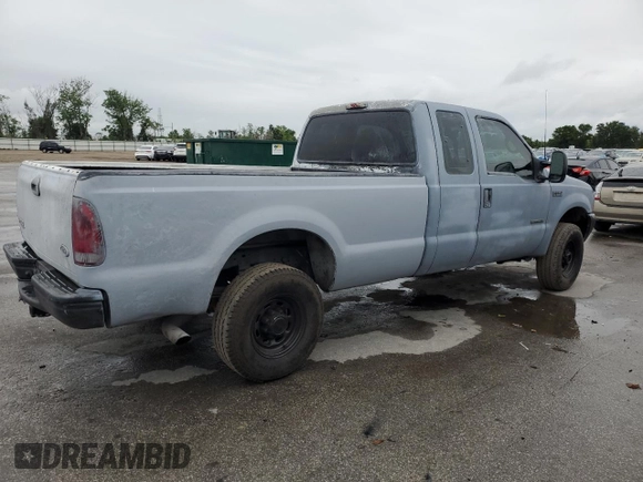 2000 Ford F-250 XL with VIN 1FTNX21F3YED35736, listed as a Copart auction lot 50309805 with 303,811 mi miles and Salvage title. Bid and sale history available at DreamBid. Image 3.