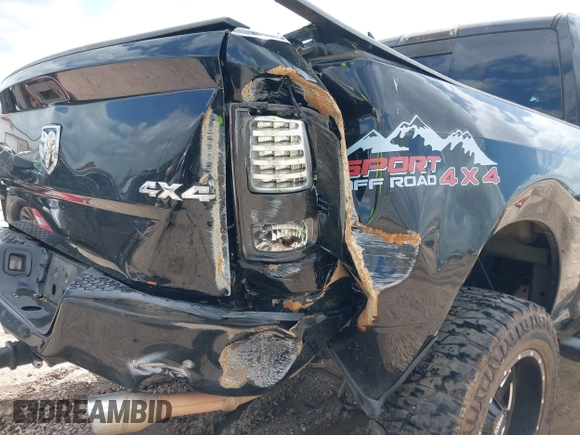 2014 Ram 1500 Sport with VIN 1C6RR7MT6ES233054, listed as a IAAI auction lot 41936407 with 144,759 mi miles and . Bid and sale history available at DreamBid. Image 6.